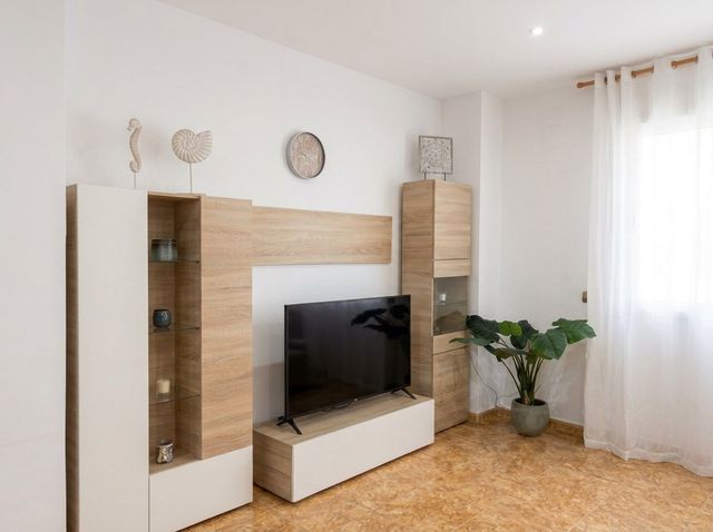 Mueble de salón con televisión